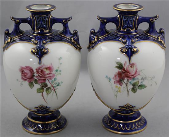 A pair of Royal Worcester ovoid two handled vases, c.1897, 19.5cm